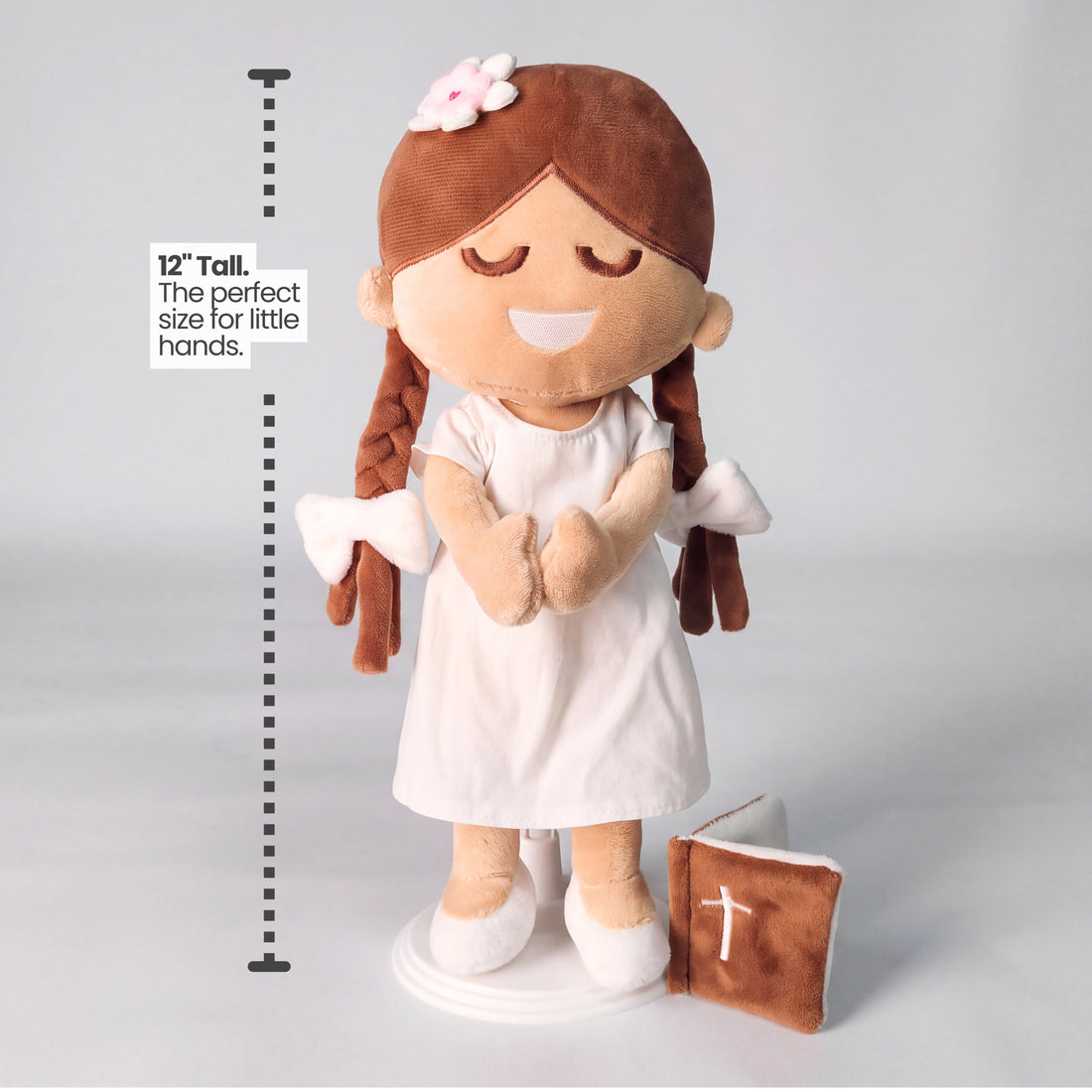 BibleGirl is the adorable plush girl doll that speaks 36 Bible verses.  Holds her Bible with magnets in her hands and in the Bible.  Wholesome dress.  Beautiful braids with bows and a flower in her hair.  Perfect Christmas gift idea for Christian girls.  From Jesusdoll.com.